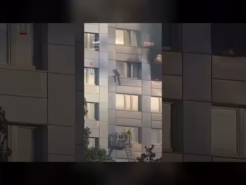 سيدة تنجو من حريق برلين بالقفز إلى سلة الإطفاء