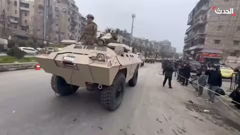 حلب: مشاهد لعرض عسكري احتفالاً بذكرى سقوط نظام الأسد
