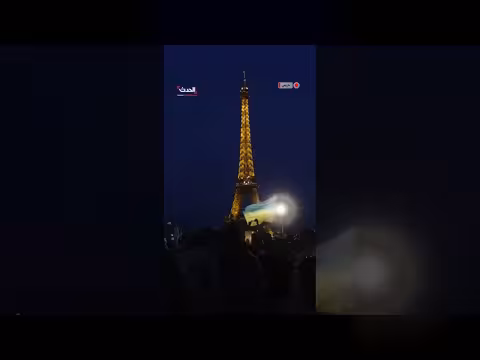 برج إيفل يضيء بألوان أوكرانيا و ماكرون ينضم لاجتماع الداعمين