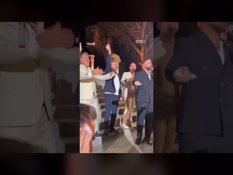 وزير الثقافة السوري ووزير الطوارئ يرقصان الدبكة في زفاف بحمص